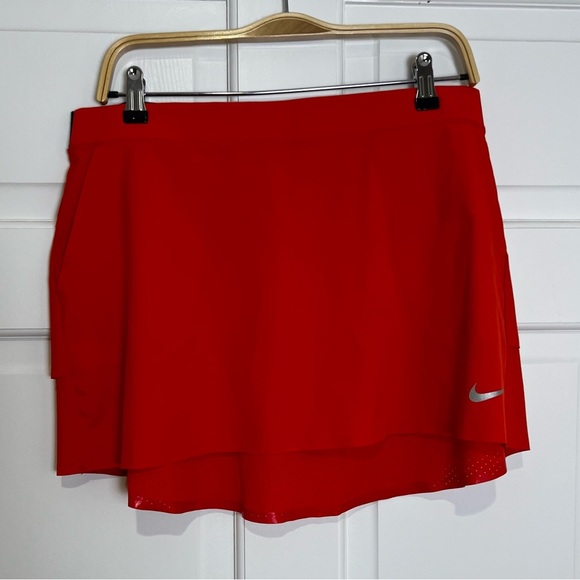 Nike Dresses & Skirts - Nike Red Mini Skirt with Silver Logo